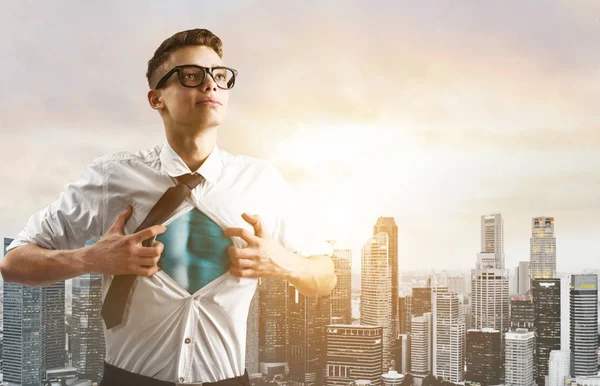 Business super hero hover over city skyline — Stock Photo, Image