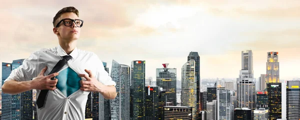 Business super hero hover over city skyline — Stock Photo, Image