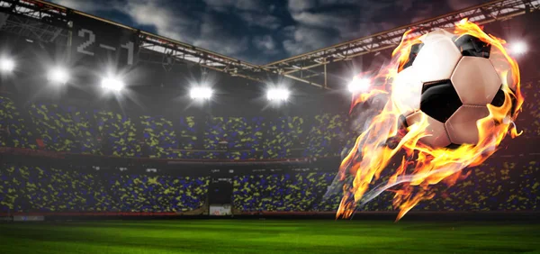 Burning soccer ball on stadium — Stock Photo, Image