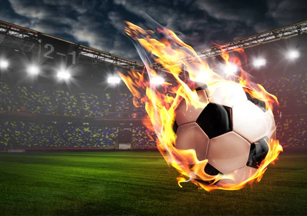 Brandende voetbal op stadion — Stockfoto