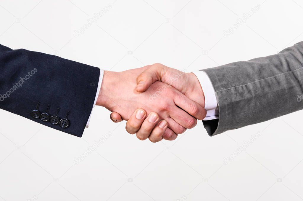 Two business men handshaking