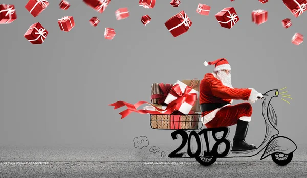 Santa Claus en scooter — Foto de Stock