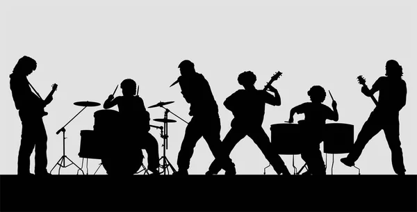 Rock band silhouet op het podium — Stockvector