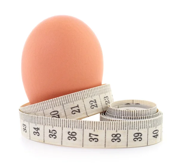 Яйце та вимірювальна стрічка . — стокове фото