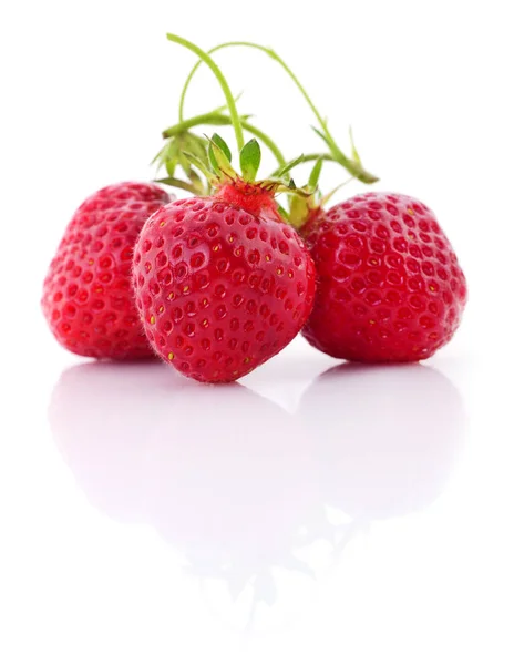 Three red strawberries. — Stock Photo, Image