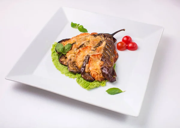 Eggplant baked with cheese on white background — Stock Photo, Image