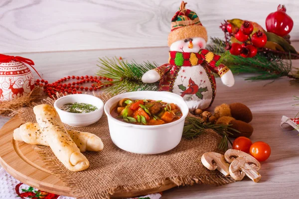 Goulash soup with cheese sticks and decor — Stock Photo, Image