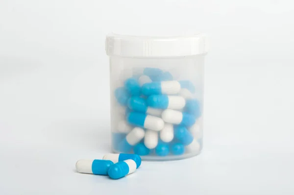Container with pills — Stock Photo, Image