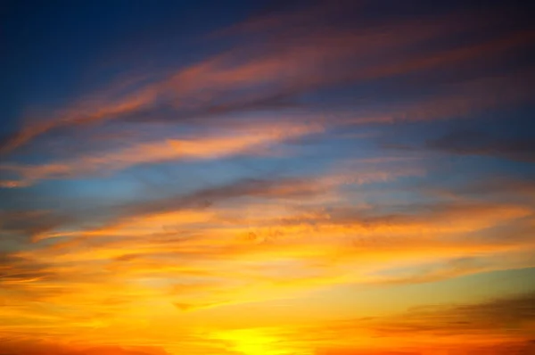 Napnyugtakor ég táj — Stock Fotó