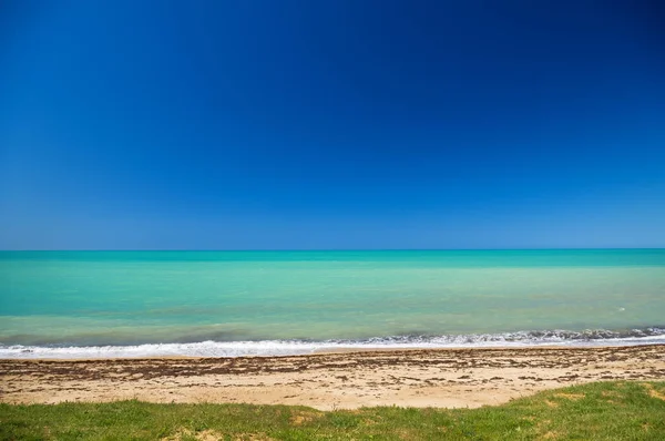 Zee strand na een storm — Stockfoto