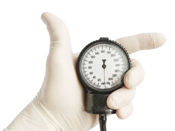 Hand in glove holding blood pressure — Stock Photo, Image