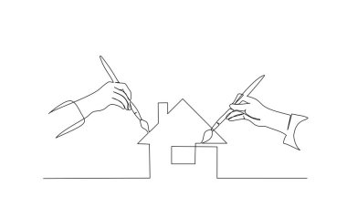 İnsanların iki eli boya fırçasıyla evi boyuyor.