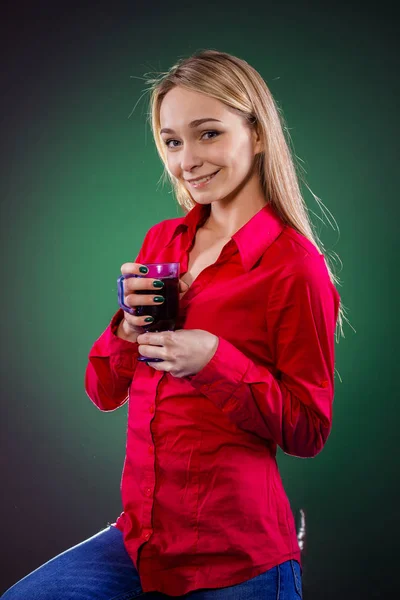 Sick woman drinking tea from illness