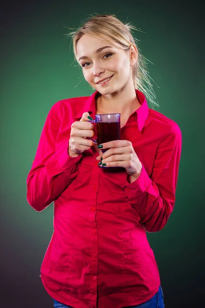 Sick woman drinking tea from illness