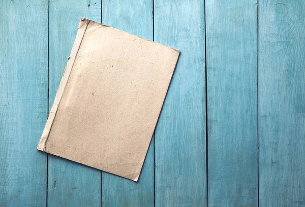 Folder on blue wooden background — Stock Photo, Image