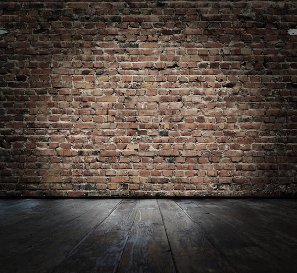 Vieja habitación con pared de ladrillos — Foto de Stock