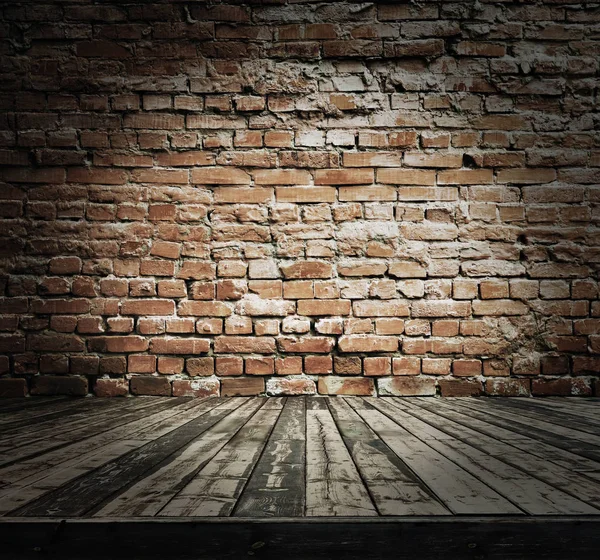 Vieja habitación con pared de ladrillos — Foto de Stock