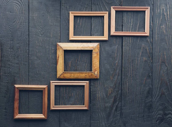 Oude frames op muur — Stockfoto