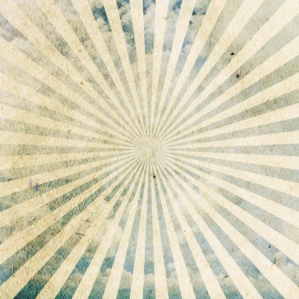 Zonnestralen op oud papier textuur — Stockfoto