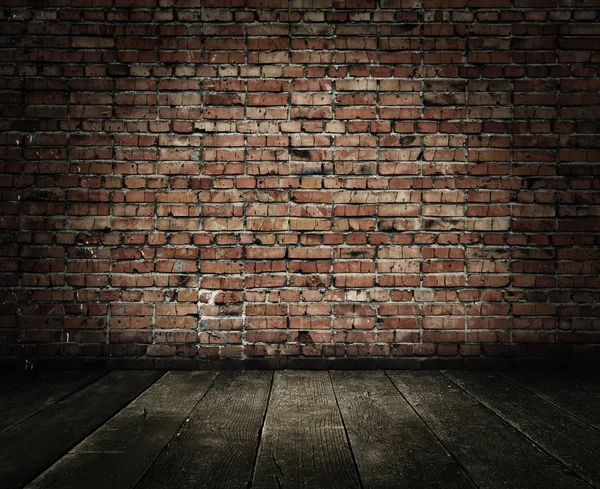 Vieja habitación con pared de ladrillo — Foto de Stock