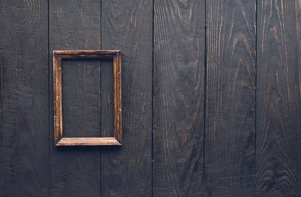 Ramka na zdjęcia na starej drewnianej ścianie — Zdjęcie stockowe