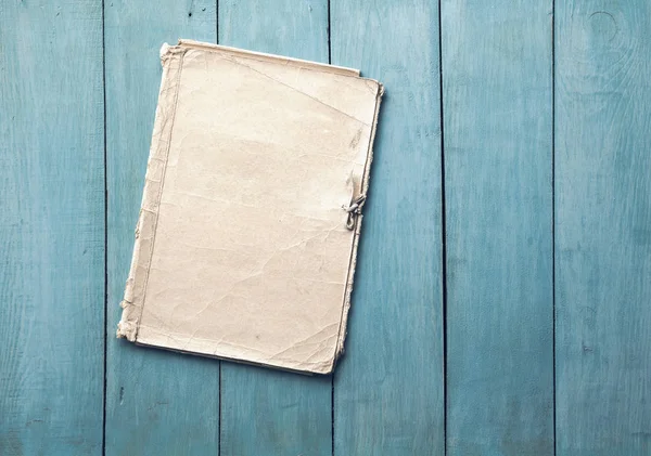 Folder on blue wooden background — Stock Photo, Image