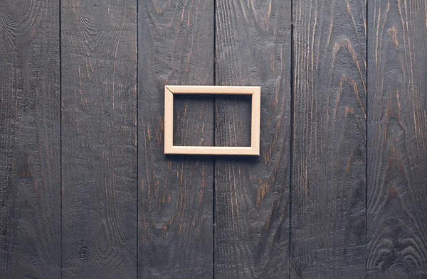 Oude fotoframe op houten muur — Stockfoto