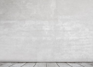 Beton duvar ve ahşap zemin