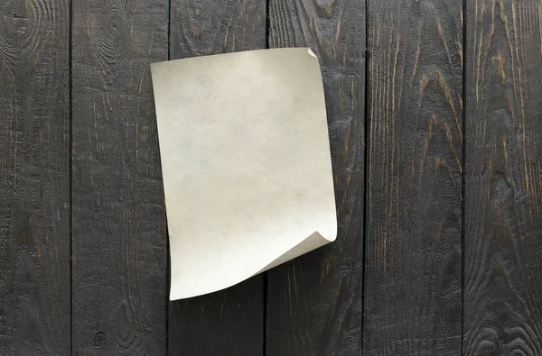 Старая Бумага Темном Фоне Деревянной Стены — стоковое фото