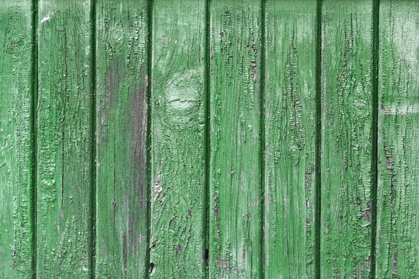old wooden wall, green background