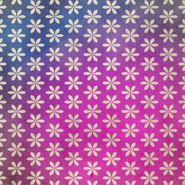 old retro pattern on grungy paper in pink colors