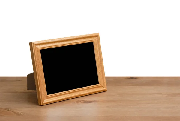 Moldura de foto na mesa — Fotografia de Stock