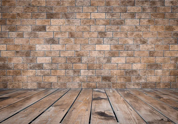 Quarto com parede de tijolo — Fotografia de Stock