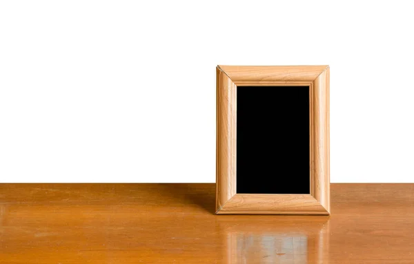 Photo frame on table — Stock Photo, Image