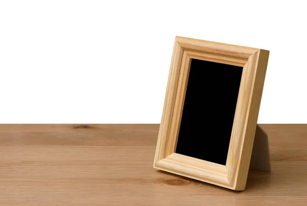 Photo frame on table — Stock Photo, Image