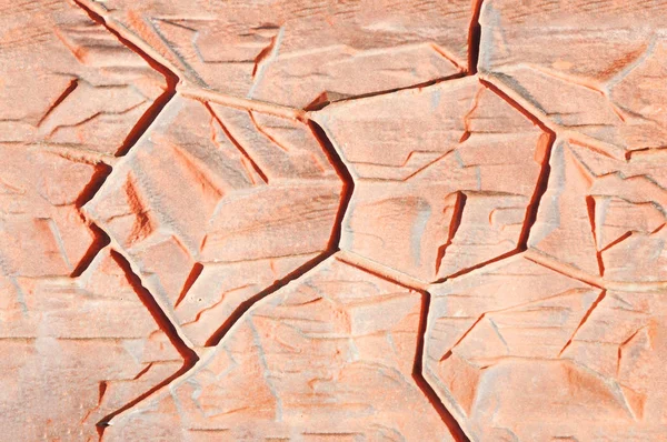 Textura roja de un muro de piedra — Foto de Stock