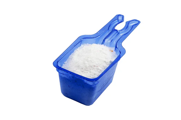 Laundry Detergent Powder and Blue Liquid Gel in Measuring Cup