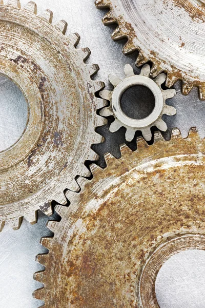 old rusty industrial gears of different size macro shot