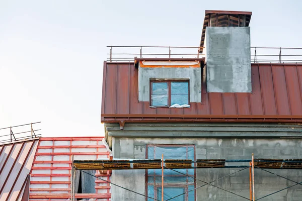 facade renovation. building construction site with scaffolding.