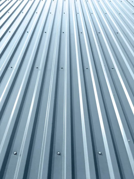 corrugated metal roof with rivets on industrial building