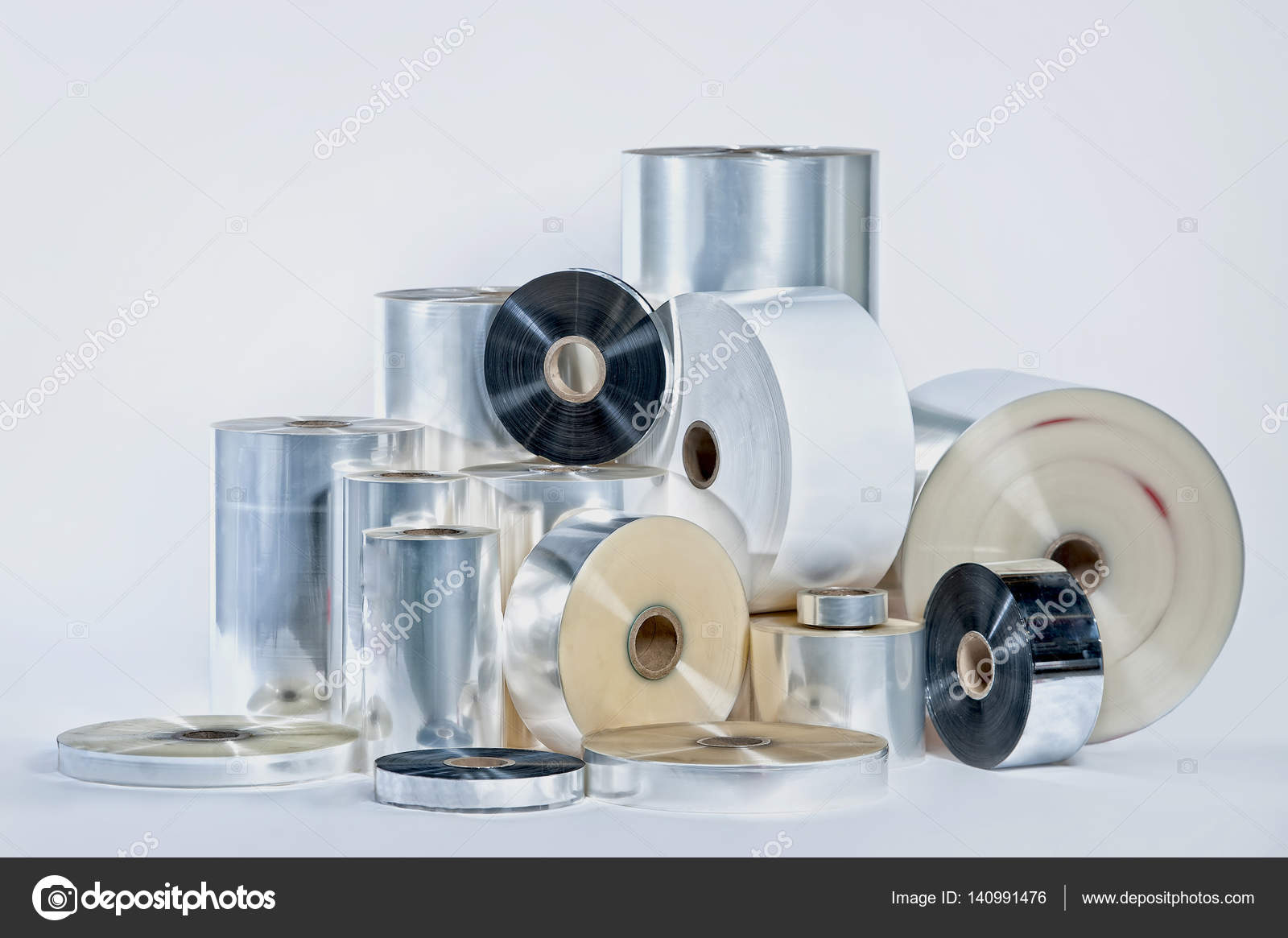 Rolls of wrapping plastic stretch film on white background ⬇ Stock