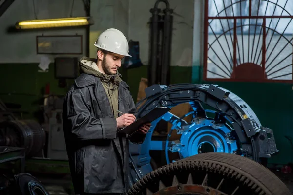 people working in the factory