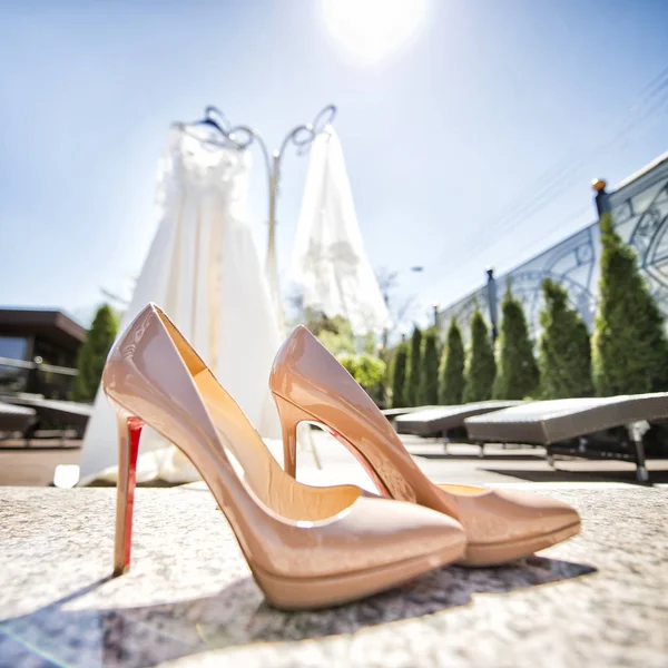 Wedding dress and shoes bride — Stock Photo, Image