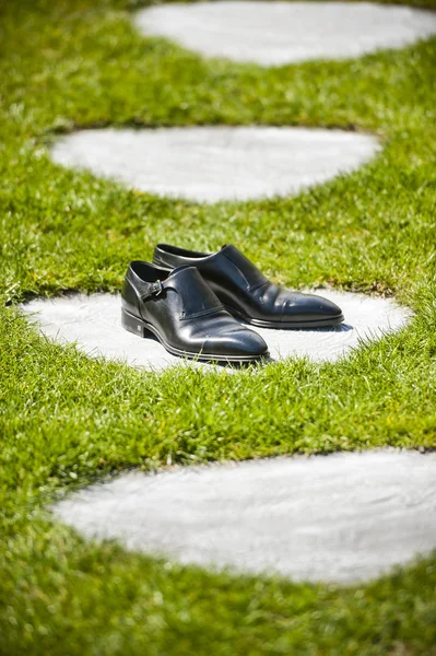 groom shoes on nature