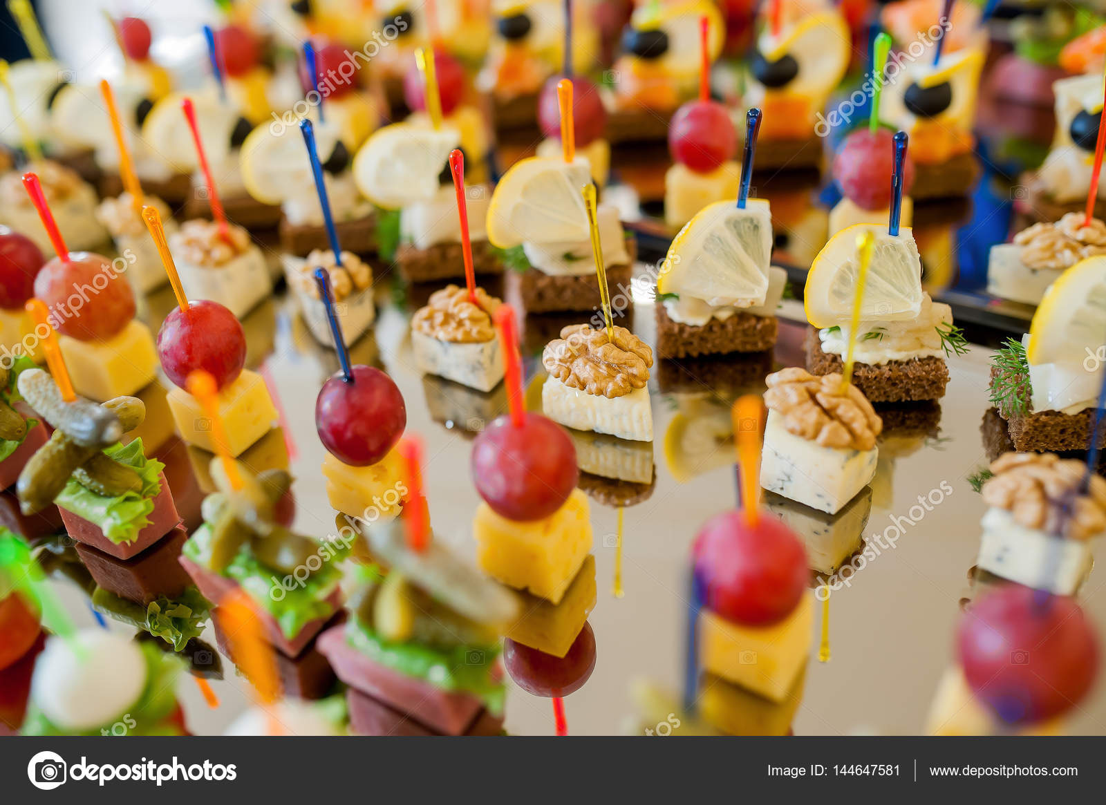 Snacks on sticks on the buffet table — Stock Photo © kiriak09 144647581