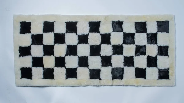Вовняний килим на білому тлі — стокове фото