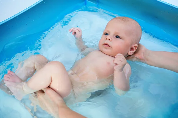 Baby in pool — Stock Photo, Image