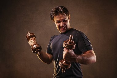 adam dumbbells ile