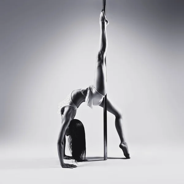 Young pole dancing woman — Stock Photo, Image