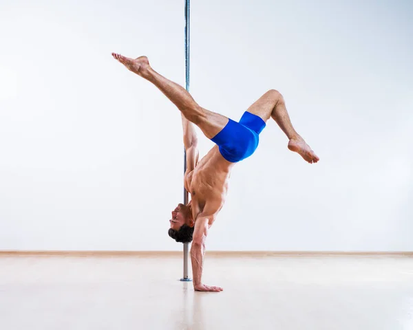 Pole dancing man — Stock Photo, Image